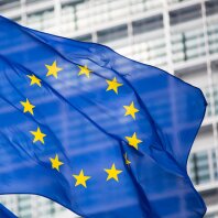 EU flag in front of Berlaymont building facade