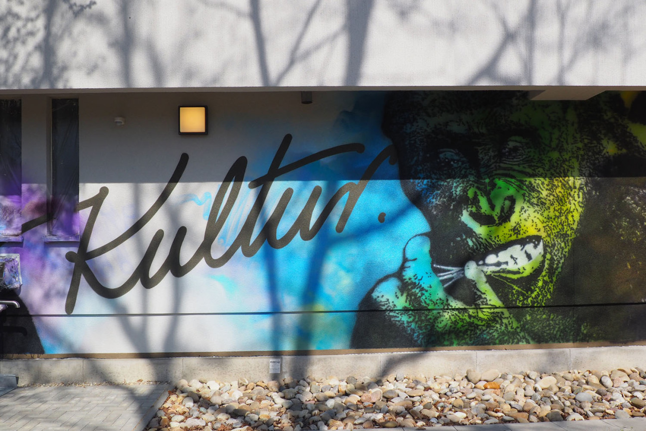 Bild © Stadt Nürnberg Bemalte Fassade des Gemeinschaftshauses Langwasser., Bild © Stadt Nürnberg